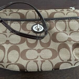 Coach Signature Brown and Tan Clutch